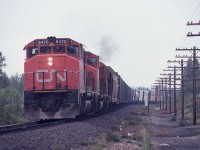 CN train 302 with 9470-9405-3118 for power has just begun to accelerate after pulling out of Capreol Yard.