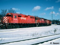 A frigid winter day sees CP GP38AC 3010 with a long string of motive power at Quebec Street yard in London, Ontario. The other units included; C-424 4237, GP9u’s 8237, 8205, 8208, 8211 and 8226. Also, on hand were SD40 5405 and SW1200RSu 1240. At the time, seeing a GP38AC on the London Division was quite rare as not many wandered down from Western Canada. 