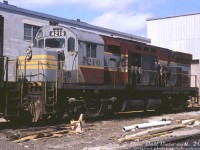Canadian Pacific MLW C424 4216 sits parked on one of the shop tracks with its hood doors open exposing its Alco 251 engine, as a pair of workers attend to her various ailments outside of CP's Agincourt Yard diesel shop.
<br><br>
CP tended to favour its 251-powered 4-axle MLW power, and they enjoyed long service lives for their type, with the final C424 and RS18u units operating into the late 90's before retirement. 4216 was resold to the Morristown & Erie in 1998, and may have seen some service, but was ultimately scrapped in 2014.
<br><br>
<i>Original photographer unknown, Dan Dell'Unto collection slide.</i>