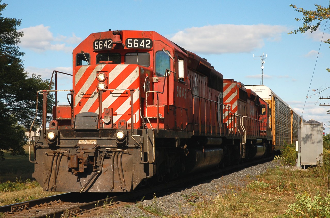 A westbound (T69 maybe?) arriving into London behind CP 5642 and CP 5906