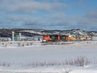 The 3 final QNSL C44-9Ws to be retired are trailing on CN 403 today, and are likely headed for Larry's Truck and Electric like the others that were sent back in 2022. During their final years of operation, they were mostly assigned as mid-consist DPUs, and rarely leading trains on the Arnaud subdivision. As you can tell by the amount of snow that piled up on top of the engines, they had been waiting their turn to take the ferry for a few months already.