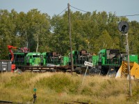 Recently Mr Mooney submitted a shot (<a href="http://www.railpictures.ca/?attachment_id=58055"> http://www.railpictures.ca/?attachment_id=58055 </a>) of some former NBSR SD40's awaiting their fate under the Main St overpass in North Bay, a few months later I stumbled across them being cut up on one of the AIM Recycling tracks (formerly Ferne Piche & Sons) just off the Temagami sub by the old CN diamond/Dysktra bypass track North of Old Callendar road.<br><br>From near to far:<br><br>3000 was built as CP SD40 5522 in 10/1966, sold to HLCX and upgraded to -2 electronics around 1999.<br><br>3001 was built as QNSL SD40 219 in 6/1971, sold to HLCX and upgraded to -2 electronics around 2000.<br><br>3002 was built as SP SD40 8448 in 9/1966, rebuilt as SD40R 7326 in 10/1980.<br><br>3004 was built as UP SD40 3021 in 3/1966, upgraded to SD40-2 in 8/1991 before being rebuilt as an SD40M-2 in 3/1994.