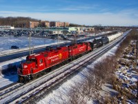 GP38-2s CP 3048 & CP 3027 head west with local CPKC G95.