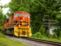 The Québec City to Montréal train, number 919, comes around a sharp bend at Rue Charles-Julien in Pont-Rouge. 
On that day, i had decided to take a glance at the switching operations in Trois-Rivières before finally deciding on catching the mainline train after a quick lunch, having already caught the Wayagamack turn. I choose not to risk going all the way to Québec, which proved to be the right move, as the train departed Henri IV yard minutes later after arriving in Pont-Rouge, at around 2 o' clock. Even if i didn't catch more switchers, i ended up being satisfied anyway!