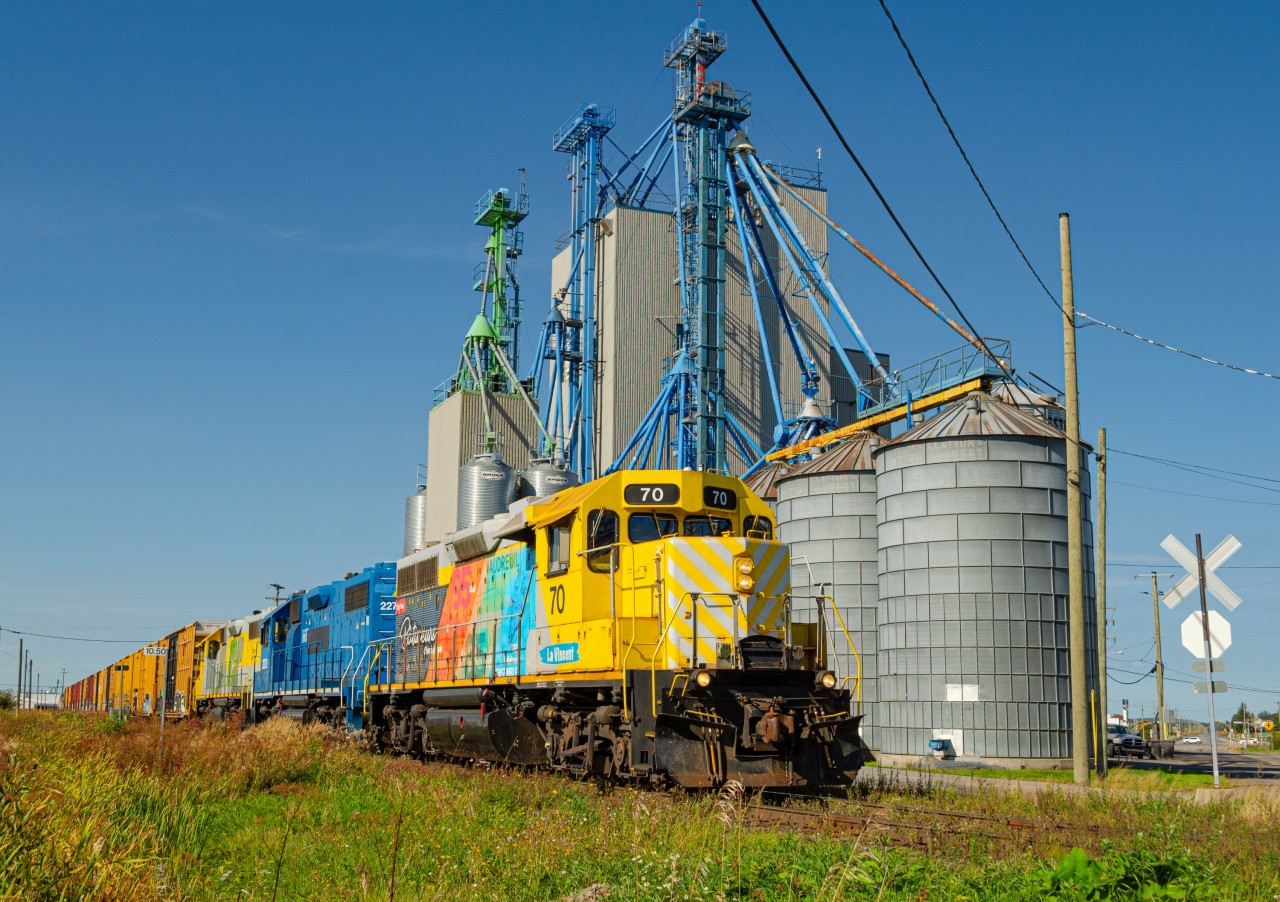 The second and final trip of the day on the Roberval & Saguenay Alma subdivision arrives at Saguenay Power Junction, which is the end of the line. The lead locomotive, RS 70, is nicknamed ''La Vincent'', as part of a school drawing contest. The 2 other sister locomotives, 71 and 72, which were purchased at the same time as 70, also were nicknamed after children who won the contest. All 3 locomotives were also later fitted with a wrap commemorating the 85th and 95th year of operation of the Vaudreuil Works (the Arvida complex) and of the railway, respectively.