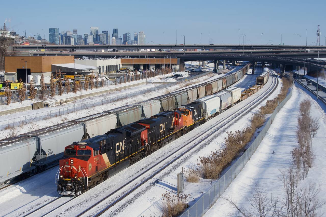 CN 527 is passing a parked potash train (CN B730) as it heads towards Taschereau Yard. Power is CN 3180, CN 2846 & CN 4765. CN B730 always parks here for a few hours to refuel and sometimes for a longer period if the train is staging.