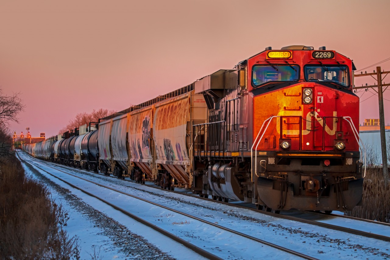 Just as the sun rises, CN 2269 idles away while waiting for approval to proceed.