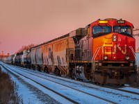Just as the sun rises, CN 2269 idles away while waiting for approval to proceed.
