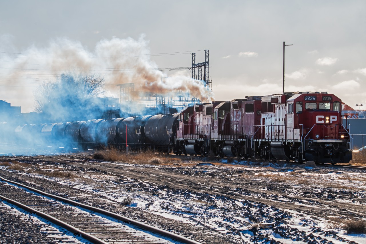 Smoking up a storm going through Winnipeg' St. James neighborhood. On their way back to the yard.