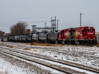 Heading back to the CPKC Higgins Yard during the first decent snow fall of the season.