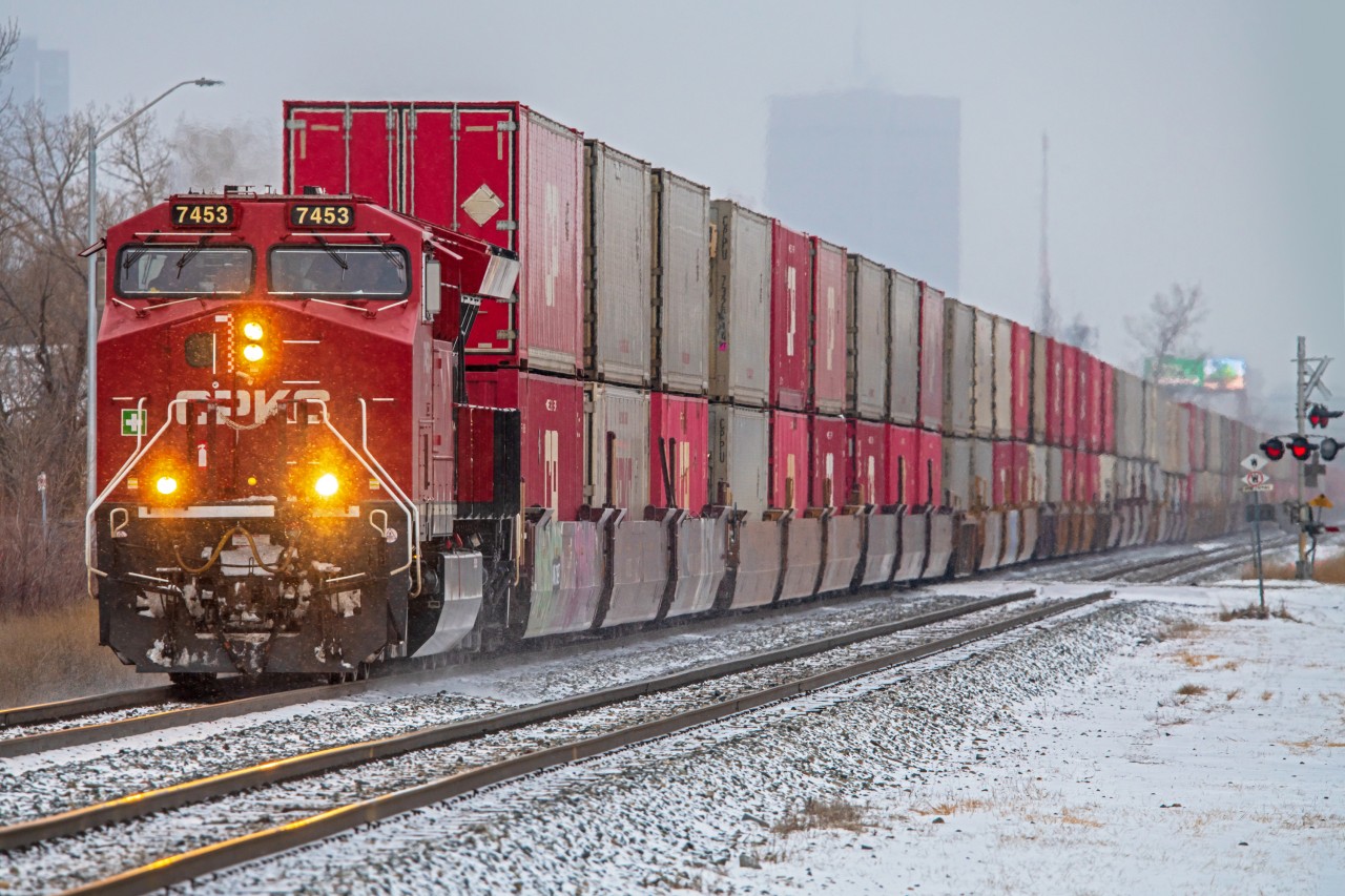Cutting through the snow in North East Winnipeg on their way out of town.