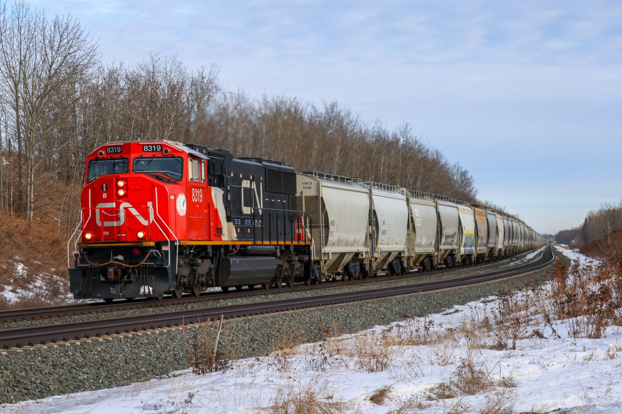 A double set of frac sand for Grande Prairie departs the Edmonton area enroute to Swan Landing, where it will be split in two for the grades and repowered.  

S 73381 16: CN 8319, CN 3847, CN 2755 – DP 1x1x1 – 196 cars