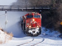 It's -15. That's not particularly cold...if you're used to it. The wind makes it feel like -25. Not horrendous if you dress for it. I didn't, but stupid should hurt. But with the sun making a very rare appearance, this was not to be missed. These are the kind of winter shots I dream of....visible speed, showcasing the railroad in its best and most determined light..... conquering my second favourite season (fall is always #1) 