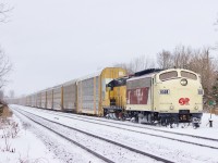 Living in the 1950’s in 2026. This pair sure have received a lot of attention lately, so myself and my boys were hoping luck would be in our side with a day off and a trip towards Woodstock. Thankfully FP9 6508 was out in the snow along with GP9 102. While all the attention goes to the veteran F unit the 102 deserves attention as well. EMD’s GP9 locomotive was one of the most successful models ever built and the 102 has the honour of being the very last one built when it was delivered to the Algoma Central Railway. I caught up with the pair after venturing through a cemetery in Ingesol. The power had just finished lifting 30+ auto racks from the CN interchange at Beachville and were heading back to home rails. Unfortunately up ahead switch and mechanical issues, thanks to the bitter cold slowed operations today, but the pair finally made Woodstock before darkness took over. 