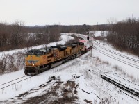 Todays CN 388 proved to be quite different than the usual CN leaders. UP 8922 with UP 8403 slowly make their way down the cowpath with a load of windmill parts where they will stop for a while and wait for the GO trains to clear before heading to the border.