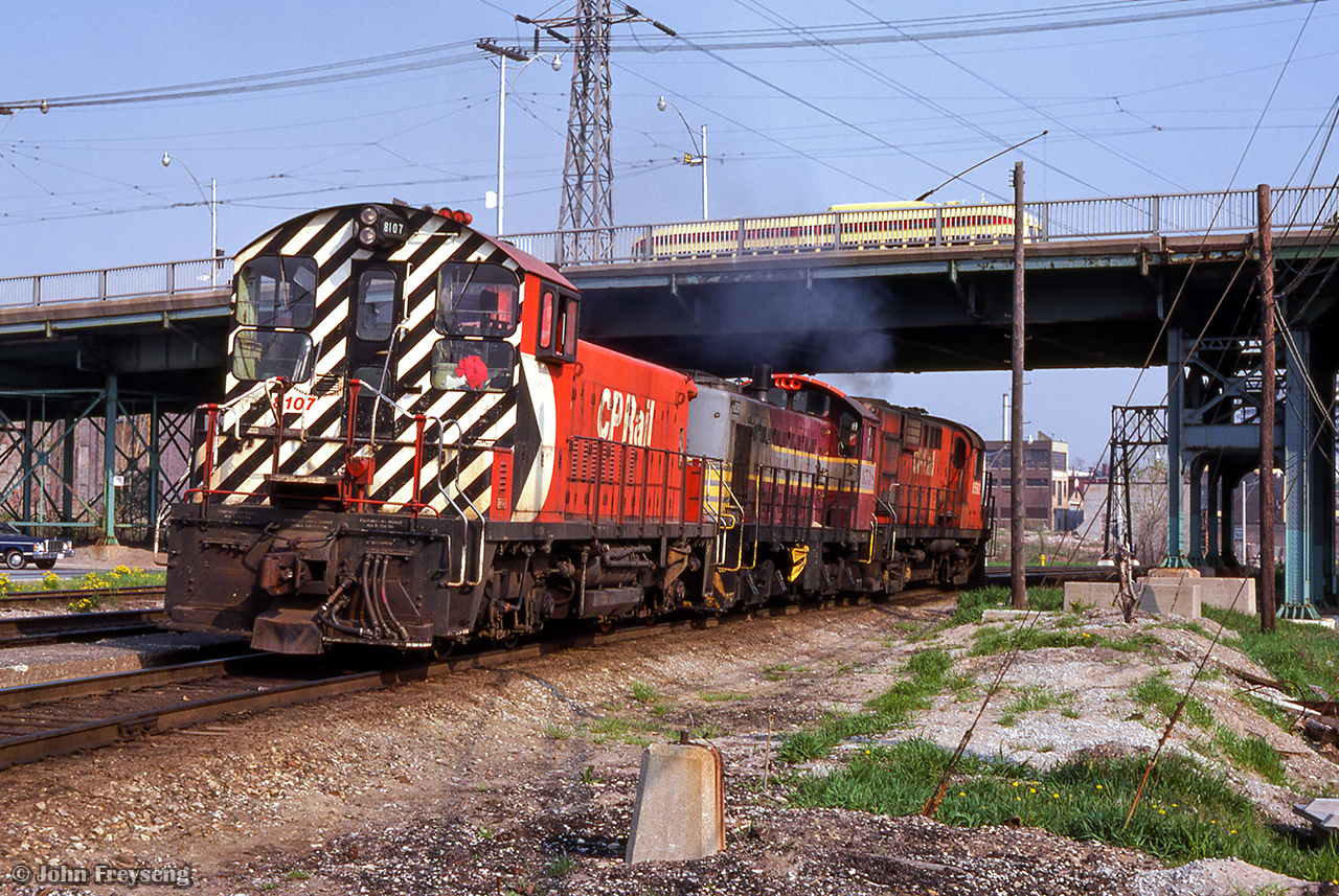 Passing the former site of Don station, CP 8592 hauls a pair of switchers up the Don Branch and on to Agincourt Yard.

Scan and editing by Jacob Patterson.
