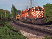CP 5016 leads a pair of 4200s westbound through Summerhill, while an eastbound switcher and van prepare to knock down the light.

<br><br><Scan and editing by Jacob Patterson.</i>