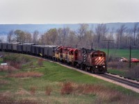 Three TH&B units, assisted by a pair of CP C424s take a phosphate rock extra upgrade at Vinemount.

<br><br><i>Bill McArthur Photo, Jacob Patterson Collection Slide.</i>