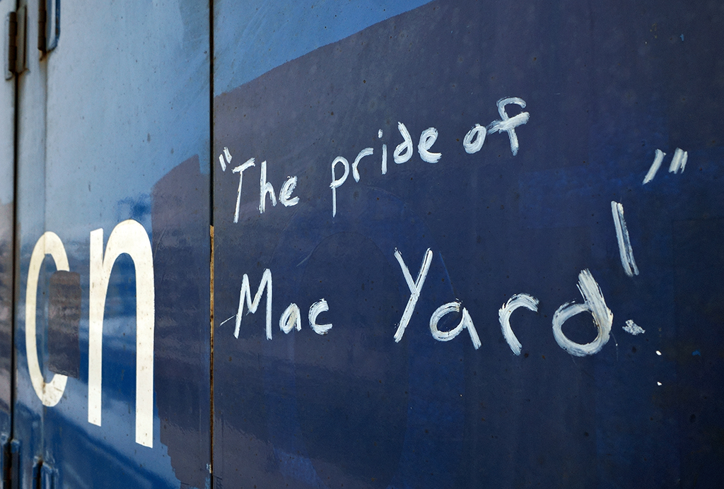 "Pride of Mac Yard" is written on the side of the CN 4908, one of many former GMTX GP38-2's bought by CN to fill out the 4 axle power shortage, while these units await upgrades and new paint. CN elected to press them into service for the time being.