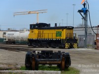 ETL 107, a former EMD Demonstrator SW1500 has just exited the Essex Terminal Railway's engine shop and will head out to start switching customers on a late April afternoon. Jacob and I took the day off to finally get to Windsor and get this operation off my list (having only been in January 2006 I always wanted to go back) and with the 2 Heritage units out and about the goal was to get one of them: we got none. Little did I know that there were plans to repaint every locomotive out of the late 20'th century yellow scheme and that these photos would age very quickly as now, there isn't a yellow locomotive on the property. Note the spur and set of trucks - that is the former ETR Belt line that ran toward Downtown to serve a few industries, the lands of this former line were sold to local developers in 1998. For anyone interested, an article on the ETR will be going to Railfan and Railroad's March edition, which you can find at newsstands (Indigo/Chapters stocks it nationwide in Canada)