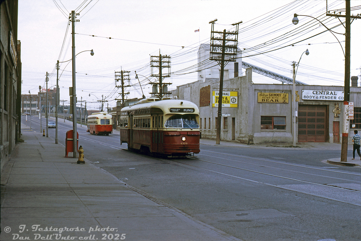 Passing through the somewhat run-down West Donlands/Corktown area of the city, TTC PCC 4379 (A6-class, CC&F 1947-48) heads westbound on King Street East at St. Lawrence Street, after passing another King PCC (46xx A11-class) on its way east to the Don River bridge in the distance (note the Coleman building). On the right is Central Body & Fender (align with Bear to stop the shimmy!) and S. McCord's cement plant along Bayview Avenue hiding behind one of the obtrusive utility poles.  Today, gentrified office buildings and condos have replaced much of the old factories and shops in this gritty scene.

Joe Testagrose photo, Dan Dell'Unto collection slide.