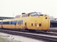 Brightly colored Via Turbo train, led by unit 149, is inbound to Toronto Union Station in July of 1982. This kid from south of the border in NY state was not sure what exactly he was looking at but took a photo anyway. The Canadian flag on the Globe and Mail building is seen just above the nose of the unit. I see that this was slide number 39 on a 36 shot roll of film, so I got the best of Kodak on that day all those years ago.
