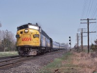 <br>
<br>
The Lakeshore #53 / Capital #43 on the crossover to the south main, 
<br>
<br>
 preparing for the Cobourg revenue stop. 
<br>
<br>
At mile 256 Kingston sub, CN Grafton, May 4, 1980 Kodachrome by S.Danko
<br>
<br>
At right is the CP Rail Belleville Sub.
<br>
<br>
Noteworthy:
<br>
<br>
A Canadian train...manufactured in Canada.... 
<br>
<br>
 GMD FP9A & B from London, FP9A ex CN 6534 built 1958, 
<br>
<br>
 MLW RS-18 built circa 195x in Montreal, 
<br>
<br>
CC&F coaches built circa 1954 in Fort William,
<br>
<br>
 NSC baggage car built circa 195x in Hamilton
<br>
<br>
sdfourty
