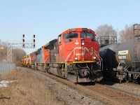 It was a nice sunny day during March Break and it was one of those days where a few good trains were running, including a CP CWR train with a fresh pair of SD40-2s. This train was also around and got me out earlier. Trailing the lead units were some ex-QNS&L and ex-KCS units (70MACs, not pictured) destined for ONR (well at least the ex-KCS ones) (if I recall correctly). Almost perfect here if the CN 8952 led. My daughter joined me since she was off of school. 