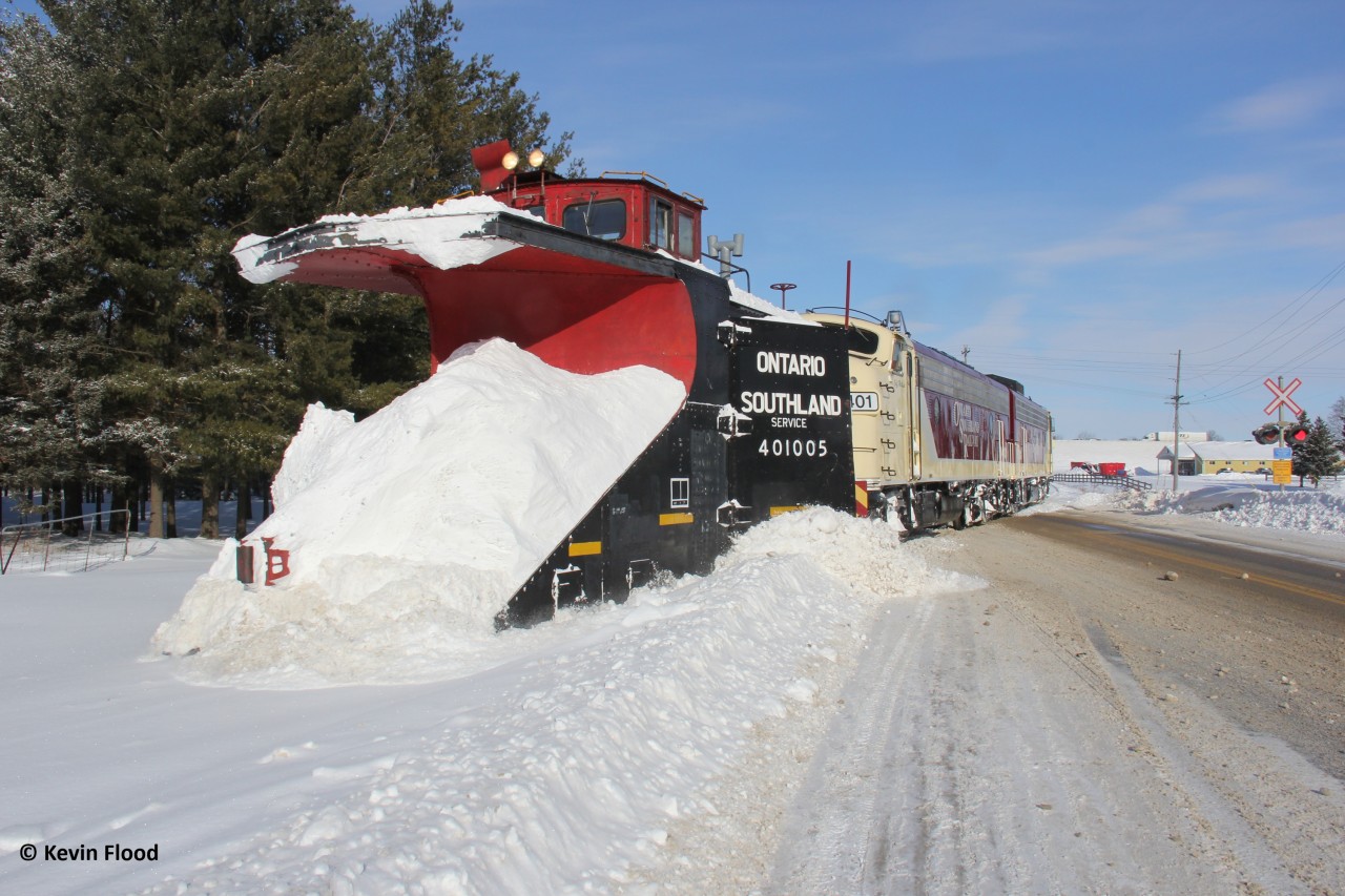 A beautiful winter day for an OSR plow extra on duty to plow the St. Thomas Sub. Here it is captured just south of Putnam as it continues south to St. Thomas from Ingersoll. The power was OSR F-units 1401 and 6508.
