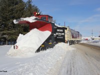 A beautiful winter day for an OSR plow extra on duty to plow the St. Thomas Sub. Here it is captured just south of Putnam as it continues south to St. Thomas from Ingersoll. The power was OSR F-units 1401 and 6508.