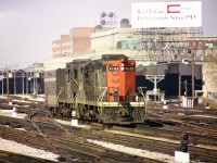 Just east of Union Station; CN 4105, 4102 and a steam jenny will soon be making up a passenger train in order to run eastward.
I'm disappointed I took that access point to the tracks for granted back then. Or maybe it was just that I did not get caught. :o)
