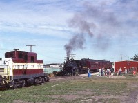 It is a nice pleasant Sunday morning, July 18, 1993 as South Simcoe Railway's historic 1883 steam engine #136  has pulled up to the station and is about to take on passengers for the 4 mile run. The building pictured is the only station. On the left is the former CP side-rod switcher, #22.
These days the #136, a 4-4-0, once the star of the National Dream TV series, is down for maintenance and will not likely be running in 2026. It will still be business as usual, running weekends from May to October this year via diesel. The run is from Tottenham to Beeton and return. In the Trackside Guide, you will find information listed under 'New Tecumseth', the regional name applied to the area.