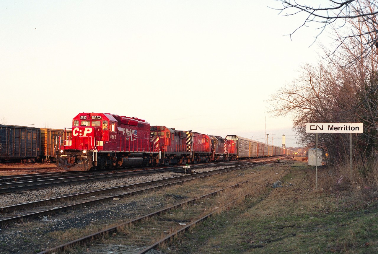 For a few days back in the spring of 1995, CP trains thru Niagara were detoured over the CN Grimsby sub while some maintenance work was being done at Hamilton's Hunter St tunnel.
As with most CP trains over the normal route I would see in Niagara Falls, they ran late in the day. It was to my advantage here in this image across from where the old Merritton station used to stand, as the late day sunlight gave the head end power a pleasant glow.
Seen here on CP's #521 are: CP 5652, 1803, 4250, HLCX 521 and CP 1815, an interesting mixture of locomotives.