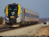 Another delayed VIA #73.  Here we have VIA Charger #2217 leading a 1 hour late Train #73 as it approaches the Rochester T/L crossing just west of Stoney Point, Ontario.  #73 has completed a meet with CN Train #438 just east of here and is not accelerating toward Windsor.  Added to the photo is one of our local idiots who decided to take his 4-wheeler for a run along the ROW to film the train as well.  I'm sure Darwin will have a conversation with this guy eventually.