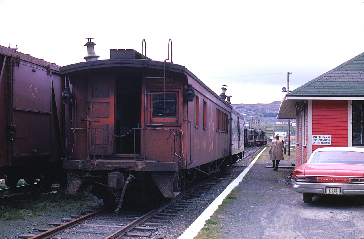 THE LEGACY OF JAMES A. BROWN - CARBONEAR END OF THE LINE. As part of a Centennial Year celebration, James A. Brown and four University of Toronto friends and spouses travelled to Newfoundland to ride and record the last of the Island’s mainline passenger services. While there, they took a day to explore the Carbonear branch and capture some great images. As seen at the end of the 38.5-mile branch, Caboose/Cabin car 6009 and Baggage 1308 wait for the G8’s to finish switching and return CN Train No. 212 to Brigus Junction on June 22, 1967 and assume the new number of 232 over the mainline to St. John’s. More of James work, as well as a slew of other North American rail photographers, can be seen in my upcoming BRANCHLINES OF NEWFOUNDLAND, to be released in a special all-colour hardcover edition this spring by Seaweed Publishing of St. Brides, NL