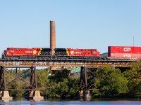 Summer winds down as 113 crosses the Trent with the Strathcona's unit in the lead.  In only a few more weeks the skyline from this location would change as the old stack was demolished. 