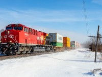 CPKC 113 is running just a little late this morning allowing for some nice winter sun as it approaches Brighton.