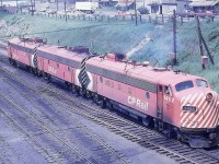 The inbound power from CP Train 2, The Canadian, has cut away from its train at the Sudbury, Ontario station.  The middle unit, 1908, will be set off while the two A units, 1402 and 1404, will be coupled back up and take number 2 to Montreal.  The 1908 will return west on that night's #1.  A yard crew will eventually take the 1908 to the shop area. 