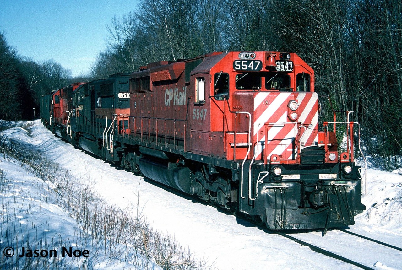 CP train 270 with SD40 5547, HATX GP40-2 513 and SD40-2 779 pauses just outside Campbellville, Ontario on the Hamilton Subdivision. The train had just entered the line at Guelph Junction and was waiting for a foreman to clear ahead before starting it’s trek down the hill towards Hamilton.