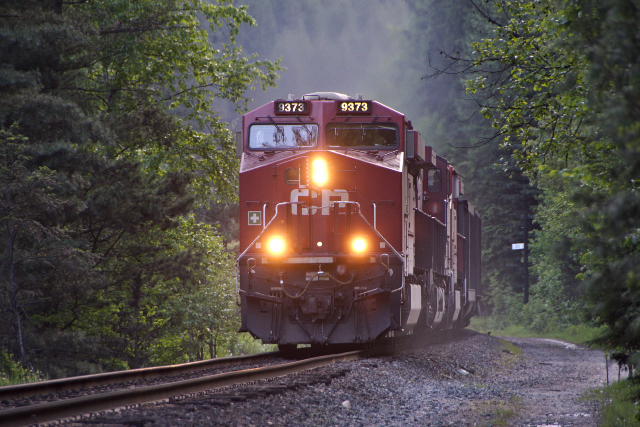 CPKC 9373 leads an eastbound empty coal train through the CPKC Shuswap Sub. At the time of this photo, trains went by every 12 minutes, equaling about 60 trains per day.