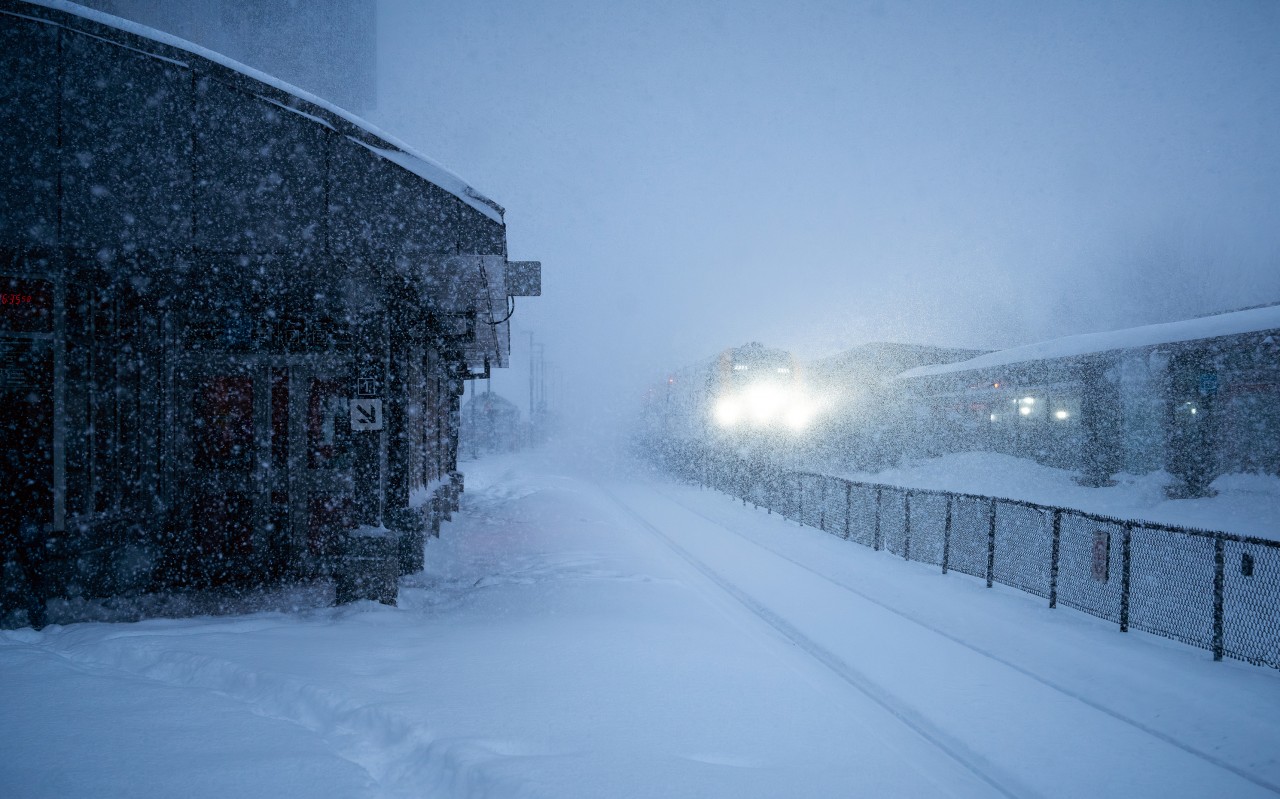 A few weeks ago now, Toronto got dumped with 56 centimeters of fresh snow, the largest one-time snow fall in Toronto's history, and a record for the city. Now, I love a good snow day, and what better way to be a part of a real-life snow globe than to pack my camera and head trackside? I found two stack trains on the CP Rail before I headed towards the lake, hoping to find somewhere I could shoot high speed intercity and commuter trains kicking up flakes. I decided on Danforth and I think I made the right choice, as here we see VIA no.53 from Gare Centrale heading west down the last few miles of the MX Kingston Sub for Union Station in the downtown core. Admittedly, this guy was moving very cautiously passed the platforms, likely going no more than 15 per hour. Frankly, I'm shocked a charger set made it that far on it's own without taking a dump and stranding everyone for seven hours.