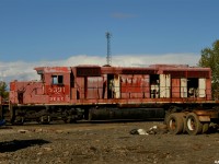 DESX 5391 sitting in the sun at DESX (now Mansour Rail)'s yard in the North East end of Sudbury showing all of her past lives, how many logos can you spot?! While I'm not sure on the exact date, shortly after this photo was taken 5391 was scrapped onsite after plans for it to become a test bed changed. During my final of several attempts at buying the numberboards, the manager (who was confident they'd need them again), noticed I had boots on and said "why don't you head in there and grab some pictures of it up close for once instead of over the fence!", deal! <br>
<br>
For more info on 5391, click <a href="http://www.railpictures.ca/?attachment_id=39887"> here </a>