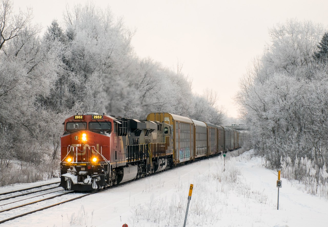 CN 2952 leads CN 271 Westbound through Copetown as hoar frost clings to all surfaces.