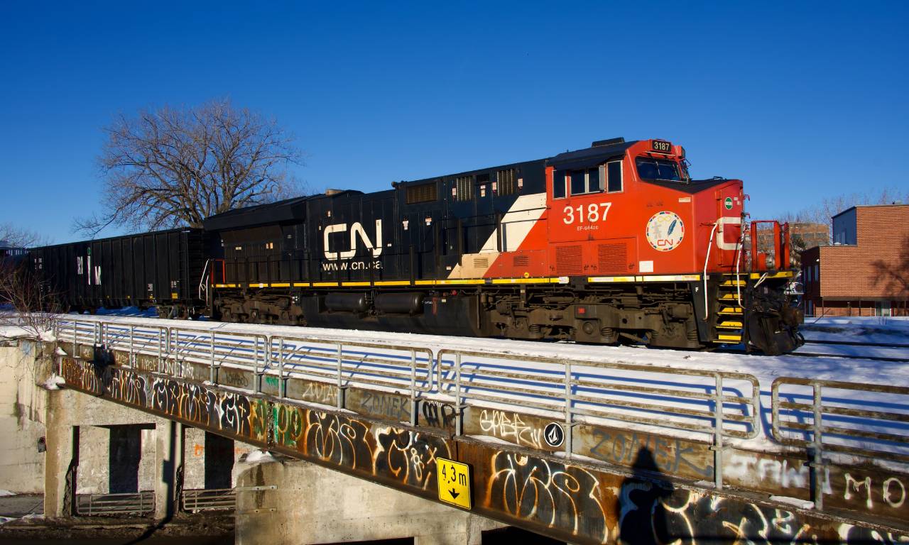 CN X310 has a new crew onboard and is about to leave the island of Montreal on a frigid morning.