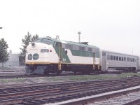 GO Transit 911 is seen west of Toronto Union Station in July of 1982. The 911 was an ex-Milwaukee loco rebuilt into an Auxiliary Power Control Unit (APCU) to serve the Government of Ontario commuter service.