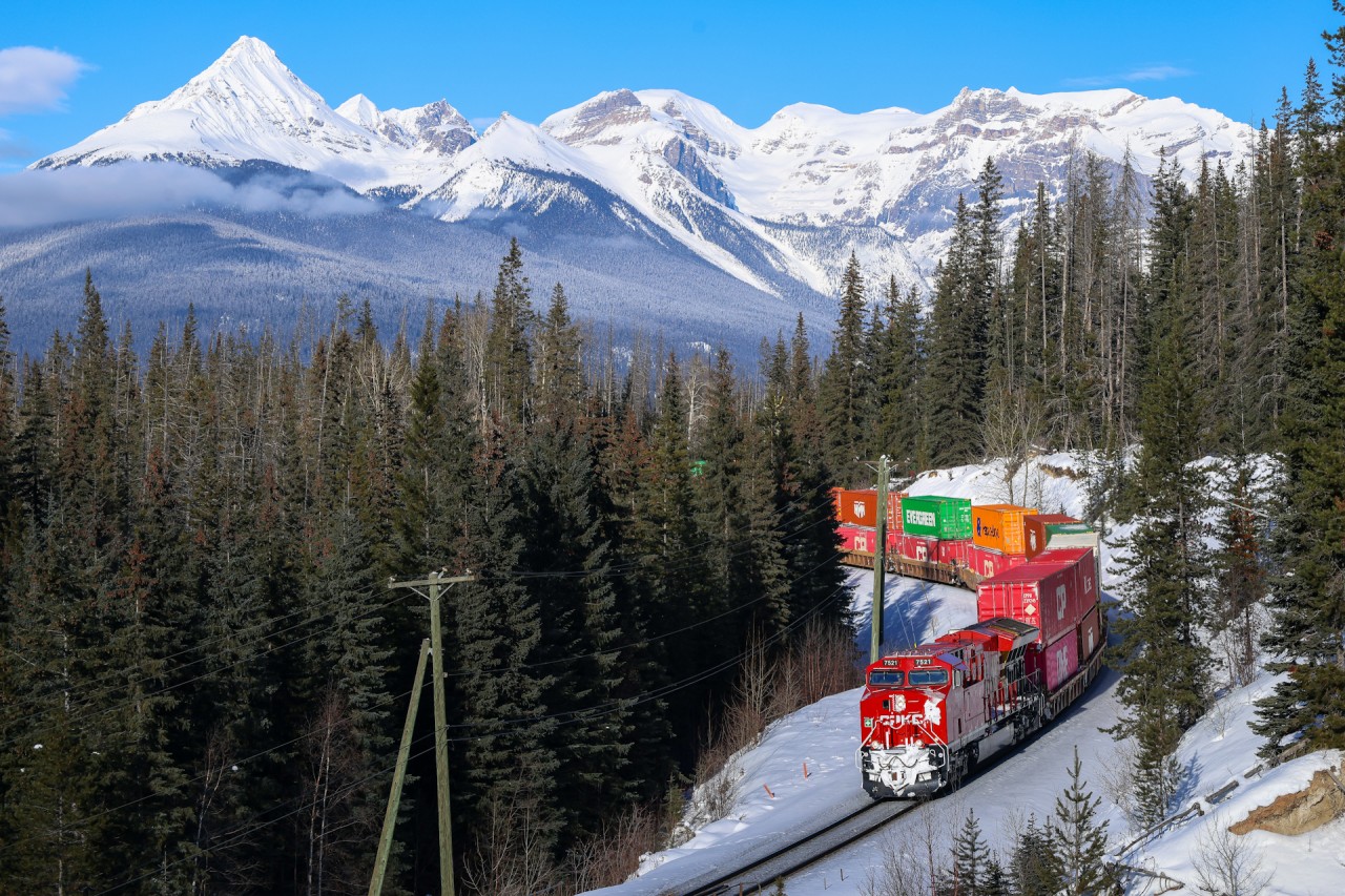 CPKC 113-21 approaches Ottertail on a beautiful winter afternoon. 

CPKC 113-21: CP 7521, CP 7491, CP 7483 - DP 1x1x1