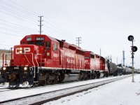 Yesterday’s oddball H24 brought back memories of the old CP Guelph Junction turn  that up till the end of the 1990’s ran between Agincourt and the junction typically with a pair of SD40’s, often working Streetsville yard on the eastbound trip. While the branch at Streetsville is restricted to four axle power the yard lead must have been exempt. Later years found a pair of GP9’s running that turn job until it was abolished. Back then Streetsville and its industries were typically served by a local out of Guelph junction until it was relocated to West Toronto by the 2000’s. Today the power typically is just a pair of GP38’s or GP20’s. When Hornby yard was converted to a trans load facility it added much needed traffic to the local and from time to time requires larger power depending on train size. Yesterday was only the second time I have seen six axle power added for a run to Hornby. The first time it was a solo SD60, this time SD40 5920. Tho lash up guaranteed there would be no work in Streetsville and a straight shot to Hornby. After catching the westbound run I figured I’d be out of luck catching the SD40 leading the eastbound run, but it took a few hours to finally make its way back home. Unfortunately the lighting conditions deteriorated and almost got blocked by a GO train but still managed to catch the train at Meadowvale. 