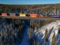 CN 8357 leads Q 10251 04 over the Sundance Creek Trestle between Big Eddy and Bickerdike. 