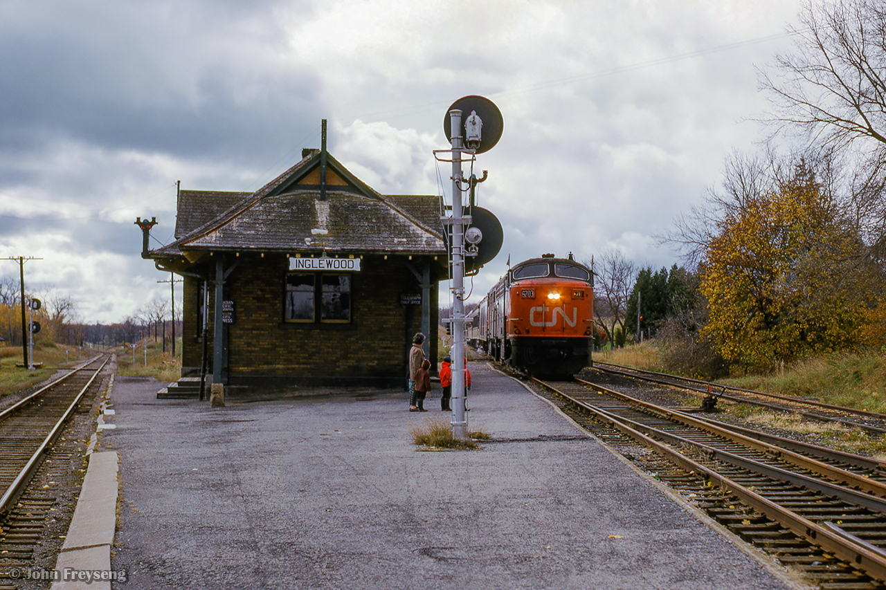The weekend of October 23 & 24, 1965 saw the Upper Canada Railway Society run an excursion on each of the class one railways. The Sunday trip running on the Canadian National behind CNR CPA-16-5 6704 and FPA-4 6774 departed Toronto Union station for Georgetown via the Weston and Halton Subs, before heading up to Allandale along the Beeton Sub returning to Union Station via the Newmarket. Here, the train passes approaches the diamond at Inglewood.

The excursion further up the line in Tottenham.

The Saturday excursion on the Canadian Pacific ran from Toronto - Hamilton - Guelph Junction - Orangeville - Toronto, seen here at Cataract.

Scan and editing by Jacob Patterson.