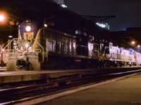 Daily except Saturday Delaware & Hudson train 10, from Montreal's Windsor Station to New York's Grand Central Terminal, sits at the platform behind a trio of ALCO RS3s awaiting its 22:20 departure time.

<br><br>In about a year's time, the D&H will attempt to revitalize their Montreal operation with the use of <a href=https://www.railpictures.ca/?attachment_id=49629>four ALCO PA-4s.</a>  More to come...

<br><br><i>Scan and editing by Jacob Patterson.</i>